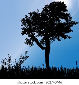 Vector silhouette of tree on the meadow.