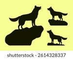 Vector silhouette of a wolf standing on a rock