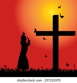 Vector silhouette of woman at the cross at sunset.