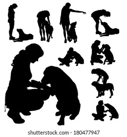 Vector silhouette of a woman with a dog.