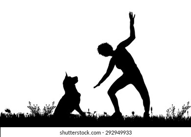Vector silhouette of a woman with a dog on a meadow.