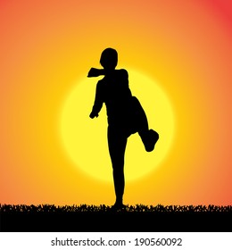 Vector silhouette of woman on a orange background.