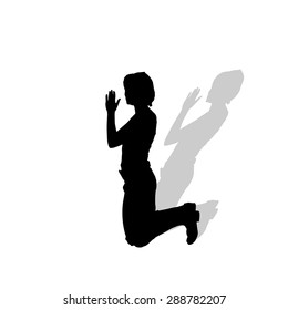 Vector silhouette of a woman praying on a white background.