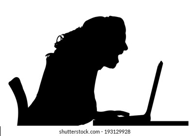 Vector silhouette of a woman sitting at a computer on a white background.