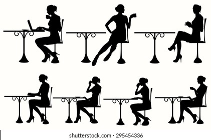 Vector silhouette of Woman Sitting At The Table. Woman having coffee / tea and using a laptop / book