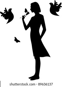 Vector silhouette of a woman smelling a flower