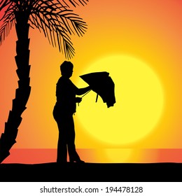 Vector silhouette of a woman at the sunset.