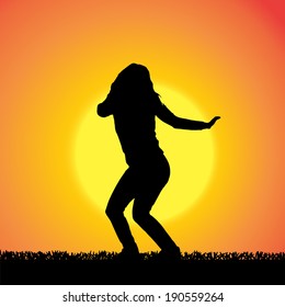 Vector silhouette of woman who dance at sunset.