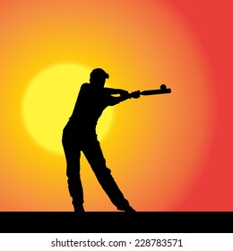 Vector silhouette of the woman who plays baseball at sunset.