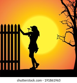 Vector silhouette of a woman working with tools at sunset.