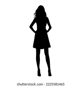 Vector silhouette of a young attractive slender woman in a summer dress, standing, black color, isolated on a white background