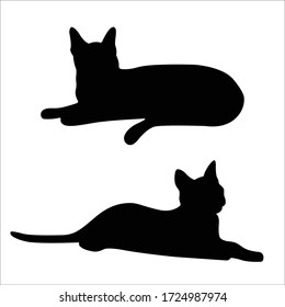 Vector silhouetted cat. A pet. Silhouettes of cats. Set of two cats in a prone position.