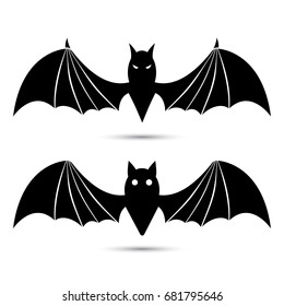 Vector silhouettes of bats isolated on white background.