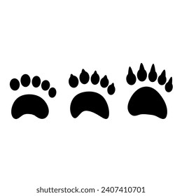 Vector silhouettes of bear paws with sharp nails and without nails. Bear footprints.