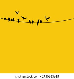 Vector Silhouettes Of The Birds On Wire At Sunset