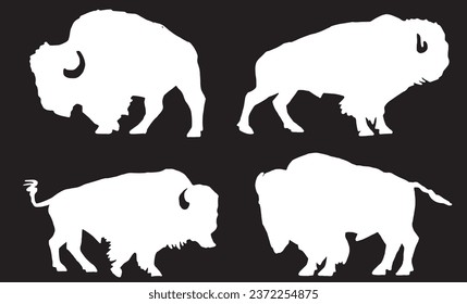 Vector silhouettes of  bison isolated on black, black figures graphical illustration