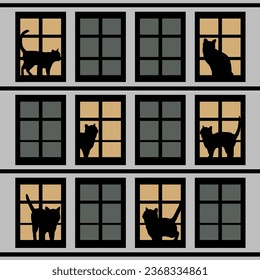 Vektorsilhouetten von Katzen in Fenstern des Hauses nachts
