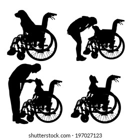 Vector silhouettes of dog in a wheelchair on a white background. 