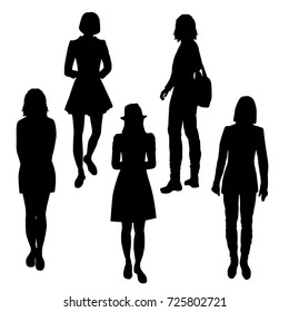 Vector silhouettes of girls standing, different poses,  black color, isolated on white background
