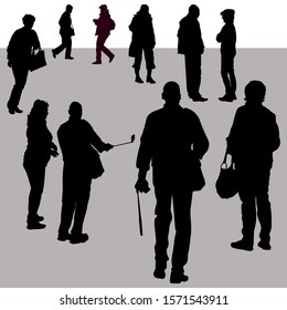 Vector silhouettes of a group of people in different poses. Men and women, pedestrians, tourists, shoppers with bags, go to work, hurry to talk people on the street in the cool season in warm clothes