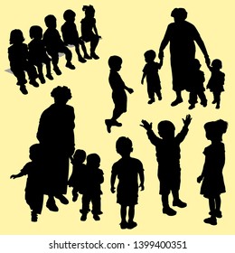Vector silhouettes of a group of preschoolers. Children sit, the boy joyfully raised his hands up the girl stands, the silhouette of the boy sideways, the woman tutor mother holds the children’s hand