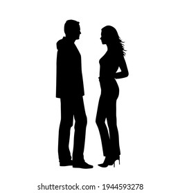 Vector silhouettes of  man and a woman, a couple of standing  business people, profile, black  color isolated on white background