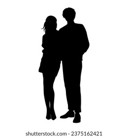 Vector silhouettes of  man and a woman, a couple standing   business people, black  color isolated on white background