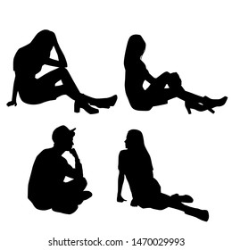 Vector silhouettes of  man and a women, a group of sitting business people, black color isolated on white background