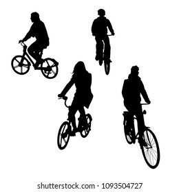 Vector silhouettes. People on bicycles in the city.