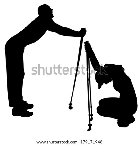 Vector silhouettes of people with walking sticks on a white background. 