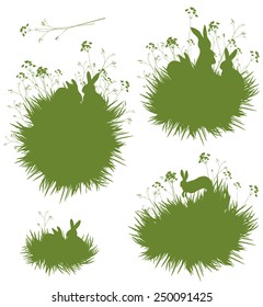 Vector silhouettes rabbits in grass.