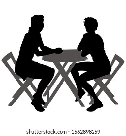 Vector silhouettes of two young women in shorts and a short dress. 2 girls sit at a table in the summer outdoors. Side view of the girls.