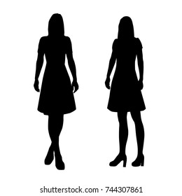 Vector silhouettes of  woman standing, couple,  black color, isolated on white background