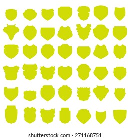 Vector Silhouettes of Yellow Shields Isolated on White Background.