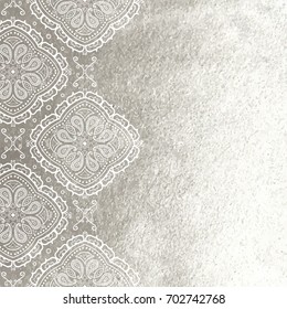 Vector silver foil background template for cards, hand drawn backdrop for invitations and posters, with ornate border white lace and copy space.