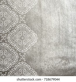 Vector silver foil background template for cards, hand drawn backdrop for invitations and posters, with ornate border white lace and copy space.