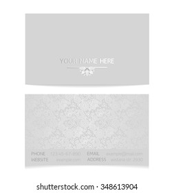 Vector silver horizontal business card template - gray silk print of front and back sides - lotus and paisley ornament with copy space