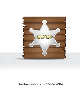 Vector silver Sheriff's badge on a wooden background.