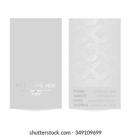 Vector silver vertical business card template - gray silk print of front and back sides - lotus and paisley ornament with copy space