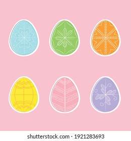 Vector simple Easter eggs. Easter eggs of bright colors. Cute clip art of Easter eggs. Printable for stickers. Easter eggs with traditional ornament.