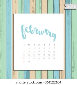 Vector simple modern calendar February 2016 on a colorful wooden texture background. Calligraphy lettering month name