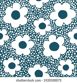 Vector simple pattern with stylized flowers. Stylish seamless background with navy blue background and daisy flowers. Floral pattern for fabric, wallpapers and wrapping paper.