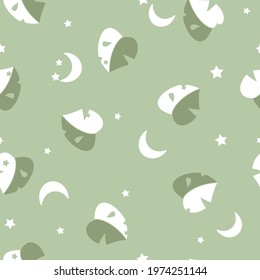 Vector Simplified Monstera Half Moon Leaves with Crescent Moons seamless pattern background. Perfect for fabric, scrapbooking and wallpaper projects.