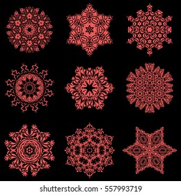 Vector sketch on black background for Christmas. Decorative pink snowflakes set. Vector illustration.