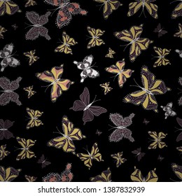 Vector sketch. Perfect for textile, wallpapers, web page backgrounds, surface textures. Cute butterfly seamless pattern in black, yellow and purple colors. Butterfly floral pattern on tropical theme.