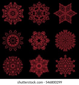 Vector sketch with red snowflakes on black background. Snowflakes set.
