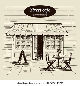 Vector sketch of a street cafe with table and chairs, flowers in pots. The illustration is drawn by hand. For restaurant menu decoration food and tourism.