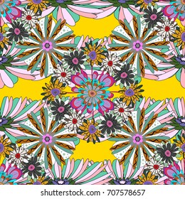 Vector sketched flower print in yellow, green and brown colors - seamless background.