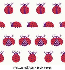Vector small red ladybugs with purple dots flying, walking and staying on light yellow background seamless pattern.Ideal for kids room decor, toddlers, bedding, clothes, bags, scrapbooking projects