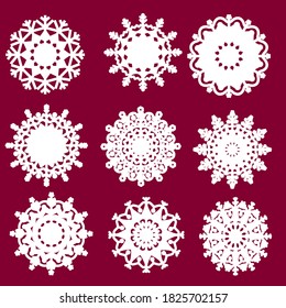 Laserschneidvorlage für Vektorschneeflocken. Cutout-Dekoration für Weihnachten oder Neujahr. Schneeflocken-Set. Hintergrund zum Winter- und Weihnachtsthema.